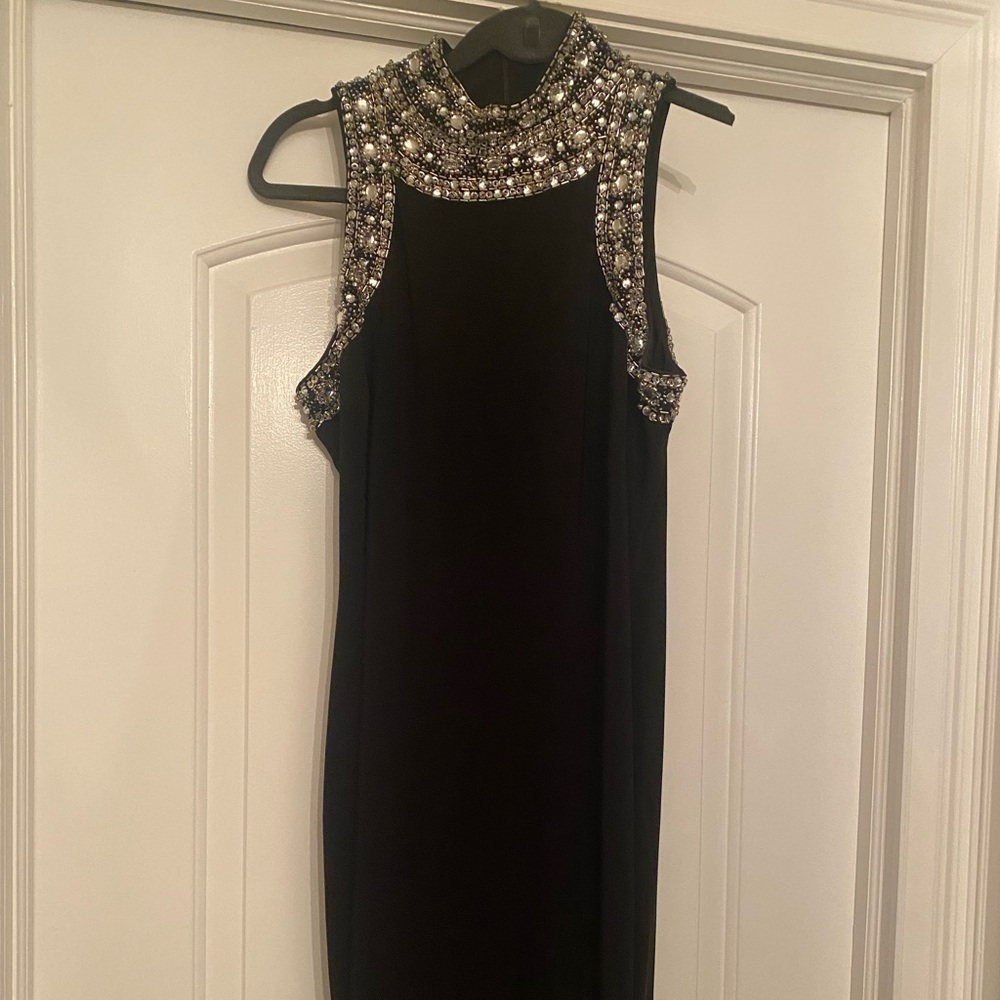 Cache black knee length cocktail dress with rhinestone detail and high neck line